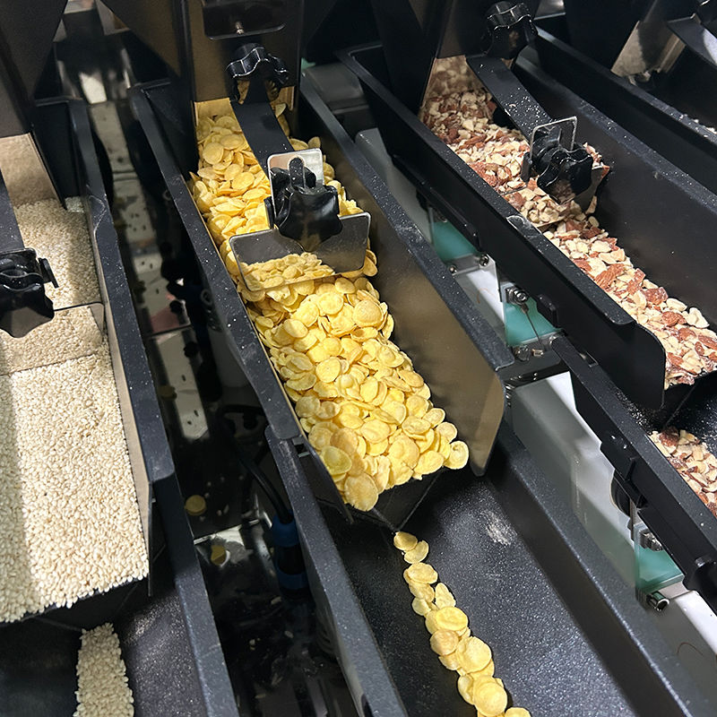 مواد متعددة 2.5 كجم آلة تعبئة طعام الحيوانات الأليفة مع الوزن متعدد الرؤوس الوزن الخطي لـ Ziplock Doypack Poch Packing