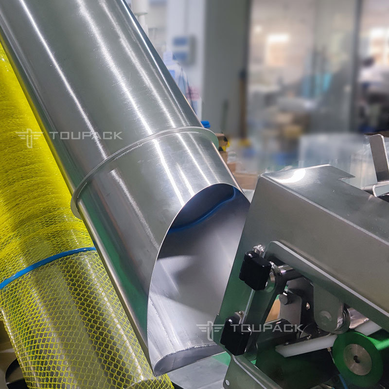 آلة تعبئة شبكية شبه أوتوماتيكية للفول السوداني والبرتقال والفواكه والخضروات والبطاطس والثوم والبصل