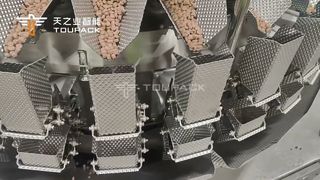 حلول تغليف أغذية الحيوانات الأليفة | ميزان متعدد الرؤوس مزود بـ 32 رأسًا + ختم تعبئة أفقي